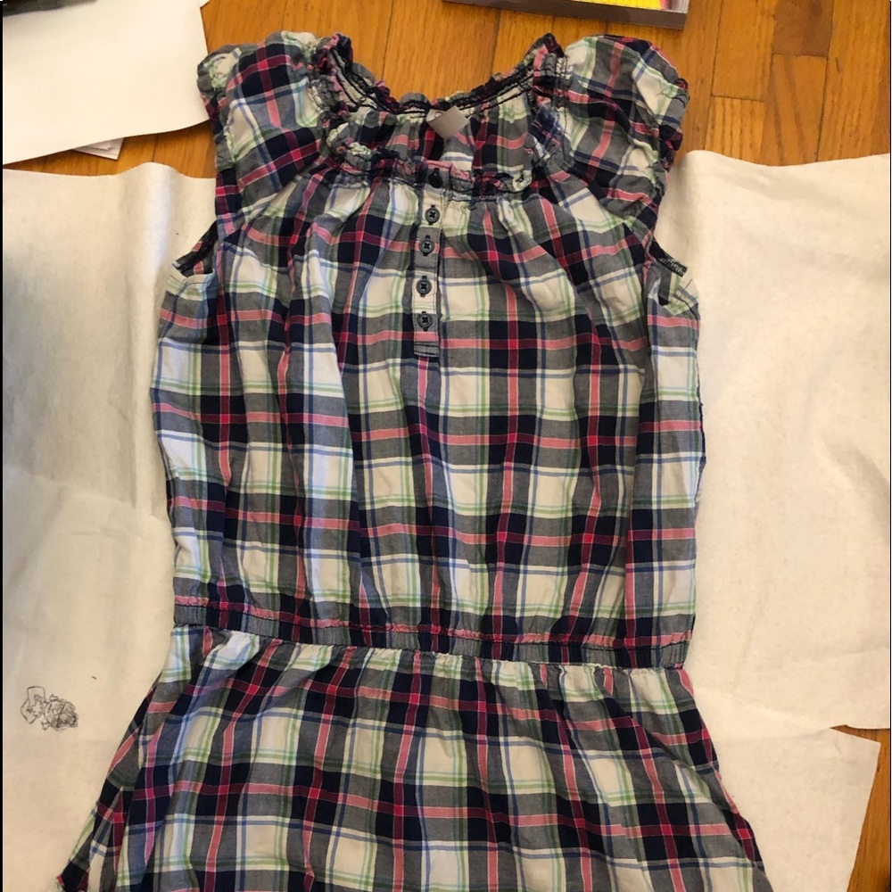 Child plaid ruffled dress size XL.